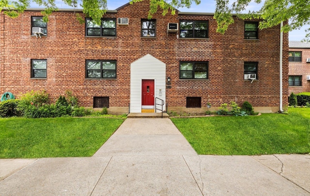 155-03 79th St Unit 188, Howard Beach, NY 11414 - view of front of home featuring a front lawn and brick siding