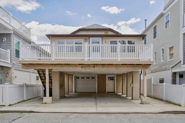 28 New Hampshire St, Long Beach, NY 11561 - view of front of house featuring a garage and driveway