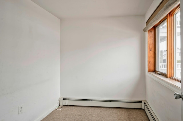 28 New Hampshire St, Long Beach, NY 11561 - empty room featuring carpet, a baseboard heating unit, and baseboards
