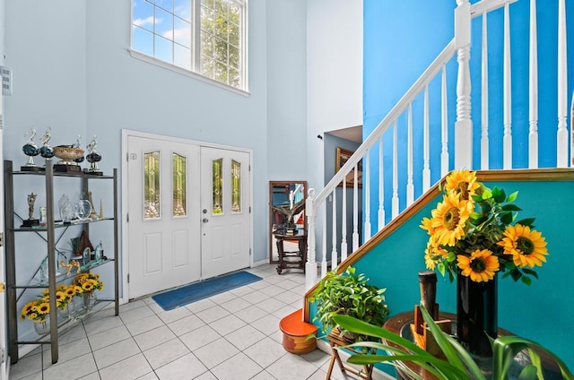361 Locust Pl, Freeport, NY 11520 - tiled entryway with stairs and a towering ceiling