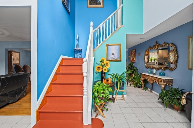 361 Locust Pl, Freeport, NY 11520 - stairs with tile patterned flooring and baseboards