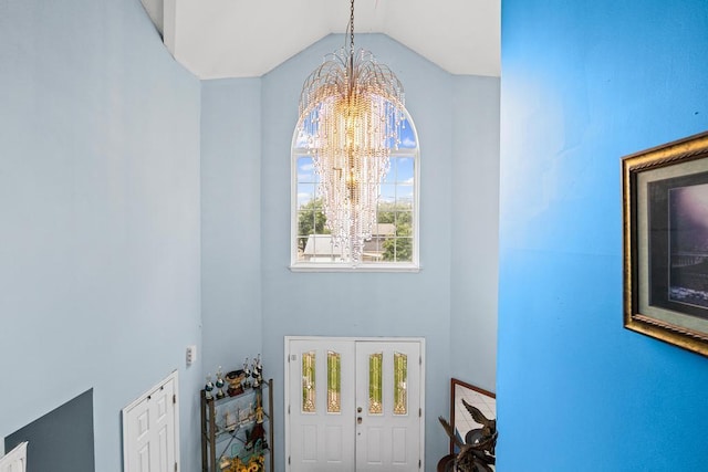 361 Locust Pl, Freeport, NY 11520 - entryway with a chandelier and high vaulted ceiling