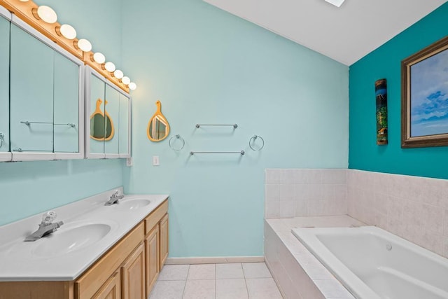 361 Locust Pl, Freeport, NY 11520 - bathroom featuring a garden tub, double vanity, and tile patterned floors
