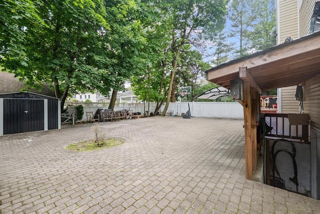 361 Locust Pl, Freeport, NY 11520 - fenced backyard with a shed and a patio