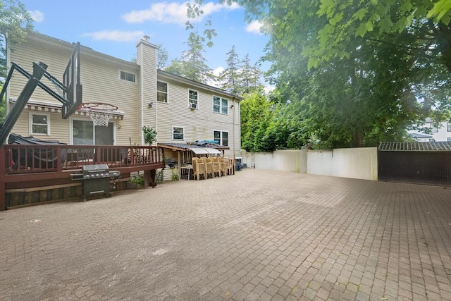 361 Locust Pl, Freeport, NY 11520 - back of house with a deck and a chimney