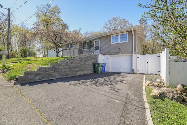 3 Chappell Pkwy, Middletown, NY 10940 - single story home featuring a gate, driveway, and an attached garage
