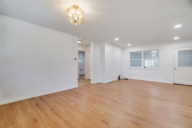 3 Chappell Pkwy, Middletown, NY 10940 - unfurnished living room featuring light wood finished floors, baseboards, a chandelier, and recessed lighting