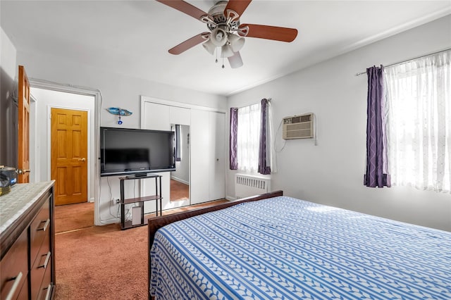 69-29 210th St Unit A, Bayside, NY 11364 - bedroom with radiator, a wall mounted AC, light carpet, a closet, and a ceiling fan