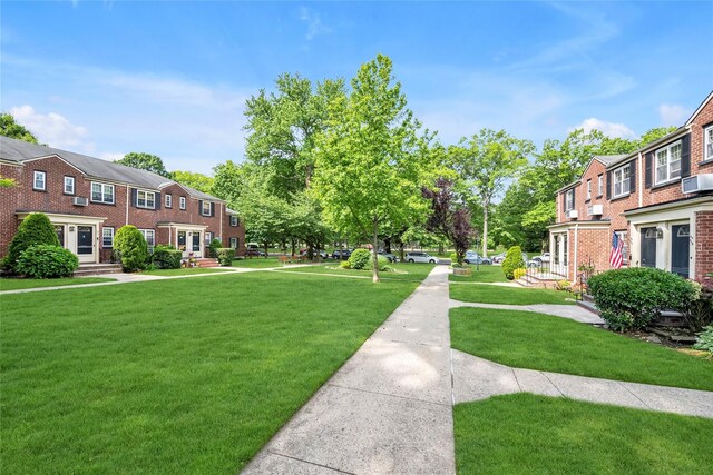 69-29 210th St Unit A, Bayside, NY 11364 - view of property's community featuring a residential view and a yard