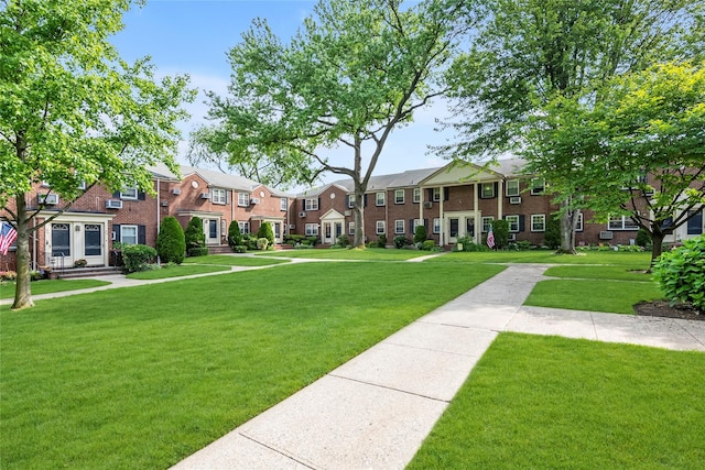 69-29 210th St Unit A, Bayside, NY 11364 - view of property's community with a residential view and a lawn