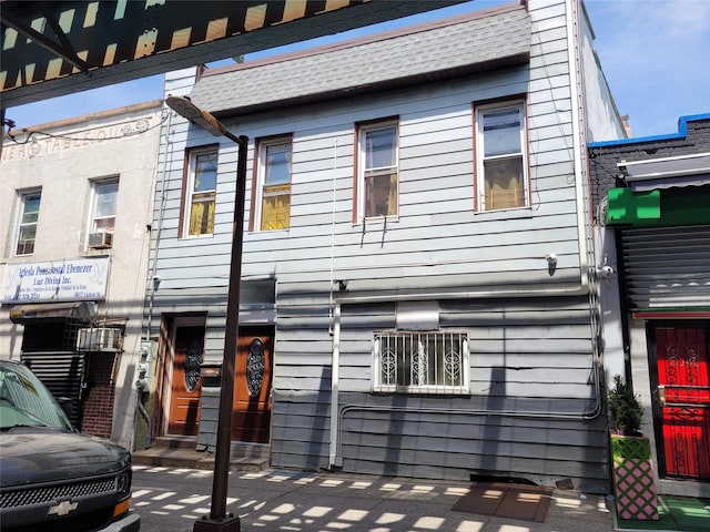 3039 Fulton St, Brooklyn, NY 11208 - view of front of home featuring roof with shingles