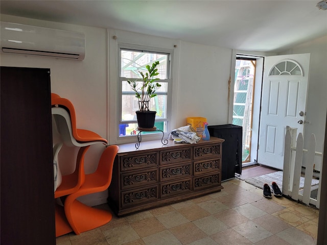3039 Fulton St, Brooklyn, NY 11208 - entrance foyer featuring a wall unit AC and stone tile floors