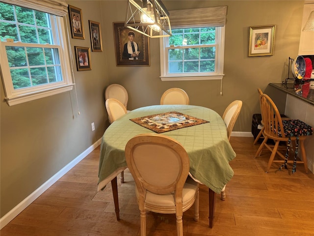 7 Yorkshire Ave, Stony Brook, NY 11790 - dining area featuring baseboards and light wood-style floors