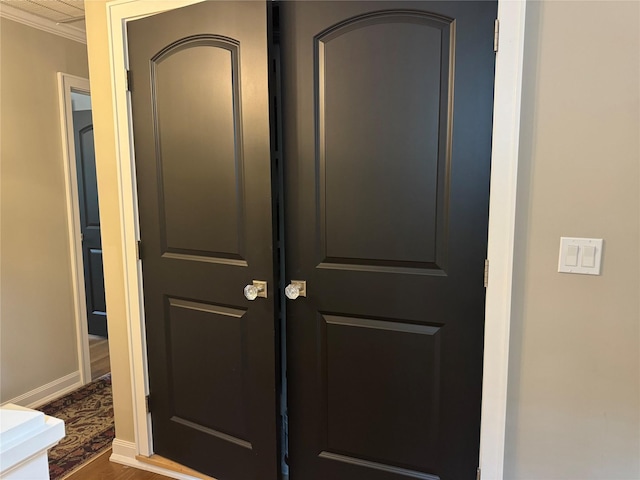 7 Yorkshire Ave, Stony Brook, NY 11790 - detailed view of ornamental molding, baseboards, and wood finished floors