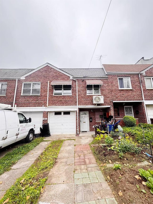 57-41 156th St, Flushing, NY 11355 - townhome / multi-family property with brick siding, driveway, and a garage