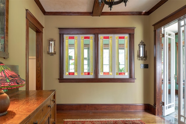 8 Elmer Galloway Rd, Katonah, NY 10536 - foyer entrance with wood finished floors, plenty of natural light, and ornamental molding