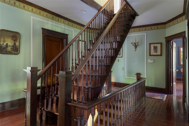 8 Elmer Galloway Rd, Katonah, NY 10536 - stairs with wood-type flooring and crown molding