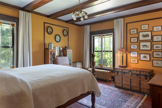 8 Elmer Galloway Rd, Katonah, NY 10536 - bedroom with radiator heating unit, a chandelier, wood finished floors, beam ceiling, and access to exterior