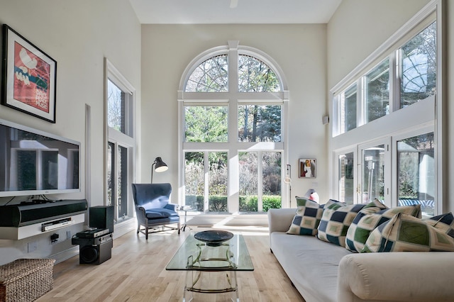 18 Harriman Dr, Sands Point, NY 11050 - living room featuring a towering ceiling and wood finished floors