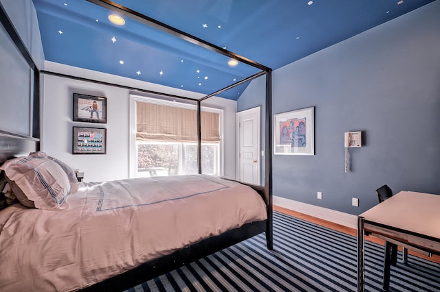 18 Harriman Dr, Sands Point, NY 11050 - bedroom with wood finished floors, recessed lighting, and lofted ceiling