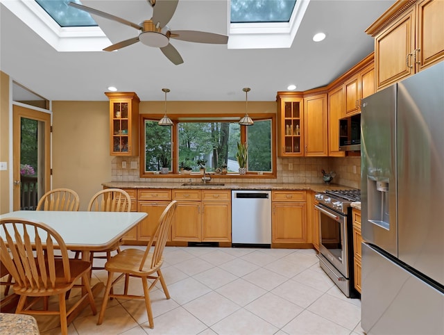 2 Hedge Row, New City, NY 10956 - kitchen with appliances with stainless steel finishes, a skylight, tasteful backsplash, ceiling fan, and recessed lighting