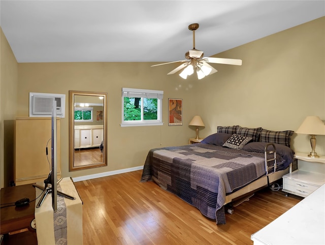 2 Hedge Row, New City, NY 10956 - bedroom with light wood-style floors, an AC wall unit, ceiling fan, and vaulted ceiling