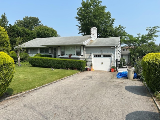 21 Stillman Rd, Glen Cove, NY 11542 - single story home with a garage, driveway, a front yard, and a chimney