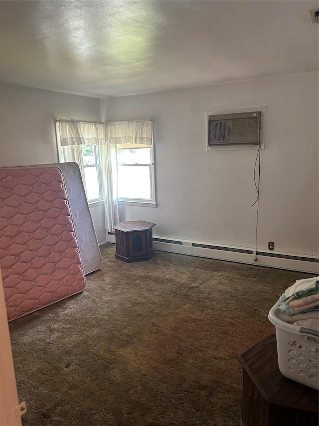 21 Stillman Rd, Glen Cove, NY 11542 - carpeted bedroom with baseboard heating and an AC wall unit