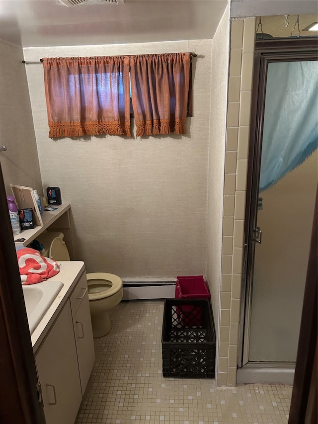21 Stillman Rd, Glen Cove, NY 11542 - bathroom featuring a baseboard radiator, vanity, a stall shower, tile patterned floors, and toilet