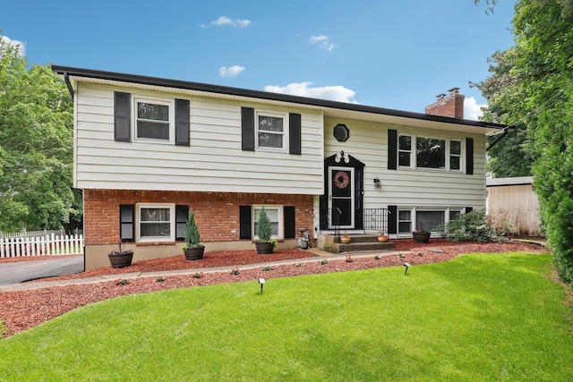 118 Standish Dr, Pearl River, NY 10965 - split foyer home featuring a chimney and brick siding