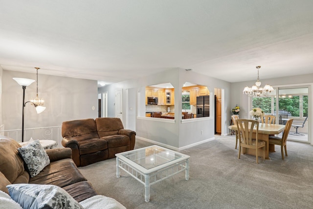 118 Standish Dr, Pearl River, NY 10965 - living room with a chandelier and light carpet