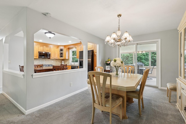118 Standish Dr, Pearl River, NY 10965 - dining space featuring carpet flooring, a chandelier, and recessed lighting
