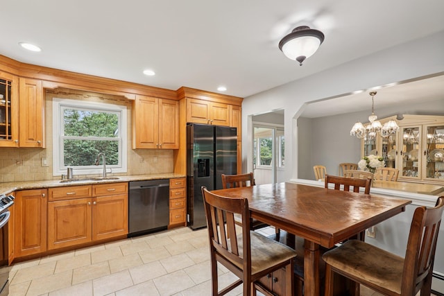 118 Standish Dr, Pearl River, NY 10965 - kitchen with dishwasher, fridge with ice dispenser, decorative backsplash, plenty of natural light, and recessed lighting