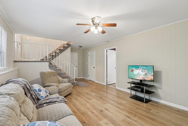 118 Standish Dr, Pearl River, NY 10965 - living area featuring ceiling fan, wood finished floors, and stairs