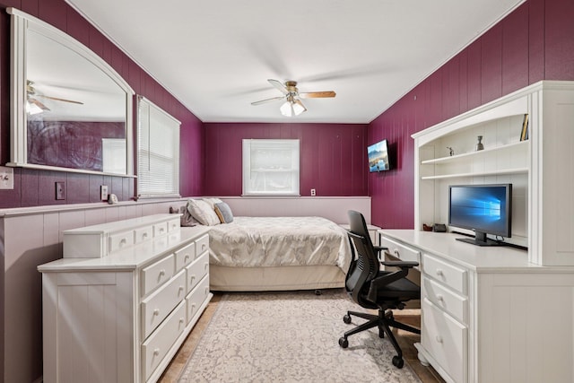 118 Standish Dr, Pearl River, NY 10965 - bedroom featuring an office area, wood walls, and a ceiling fan