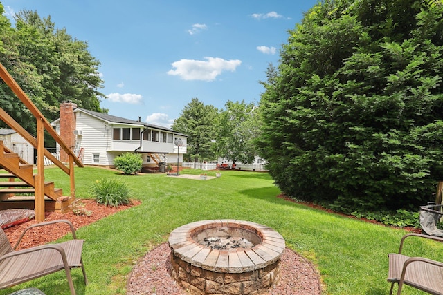 118 Standish Dr, Pearl River, NY 10965 - view of grassy yard featuring stairs and a fire pit