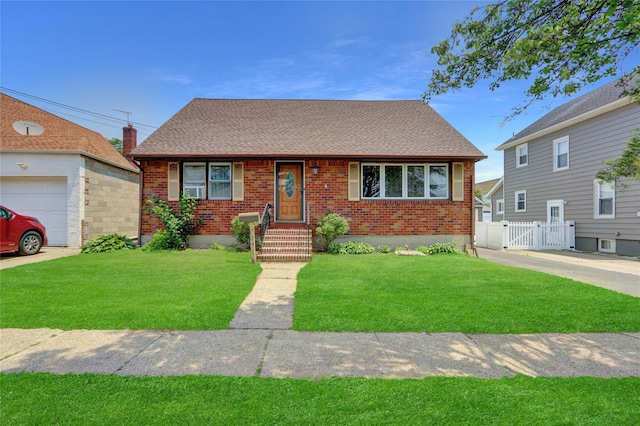 104 S 3rd St, New Hyde Park, NY 11040 - view of front of property with brick siding, roof with shingles, and a gate