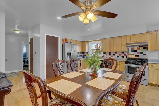 104 S 3rd St, New Hyde Park, NY 11040 - dining area featuring a ceiling fan and light wood-style flooring