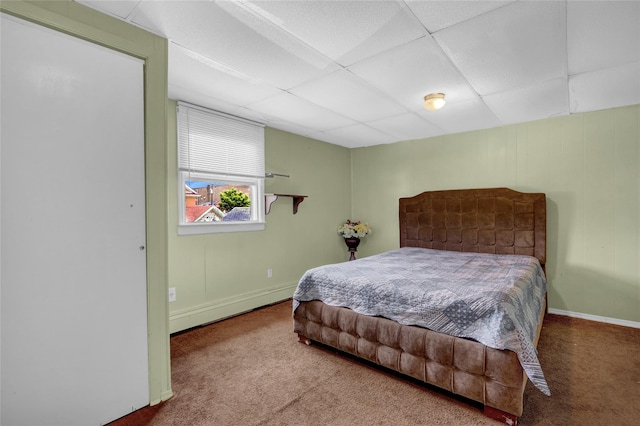 104 S 3rd St, New Hyde Park, NY 11040 - bedroom featuring a drop ceiling, carpet flooring, and a baseboard heating unit