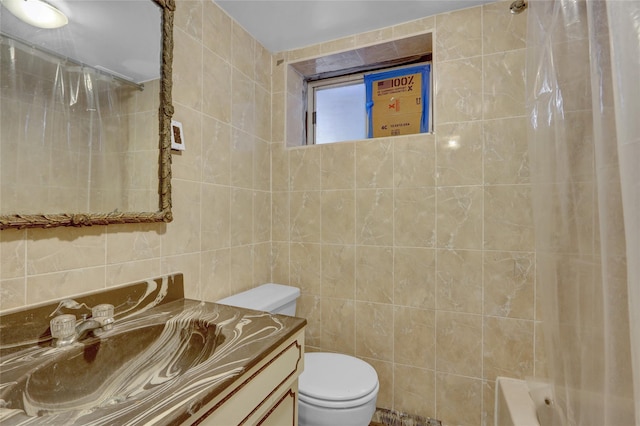 104 S 3rd St, New Hyde Park, NY 11040 - bathroom featuring tile walls, vanity, and shower / bath combo