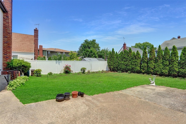 104 S 3rd St, New Hyde Park, NY 11040 - fenced backyard featuring a patio
