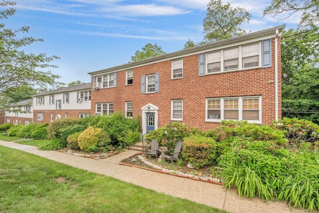 61 Columbus Ave Unit 1B, West Harrison, NY 10604 - view of front of home with brick siding