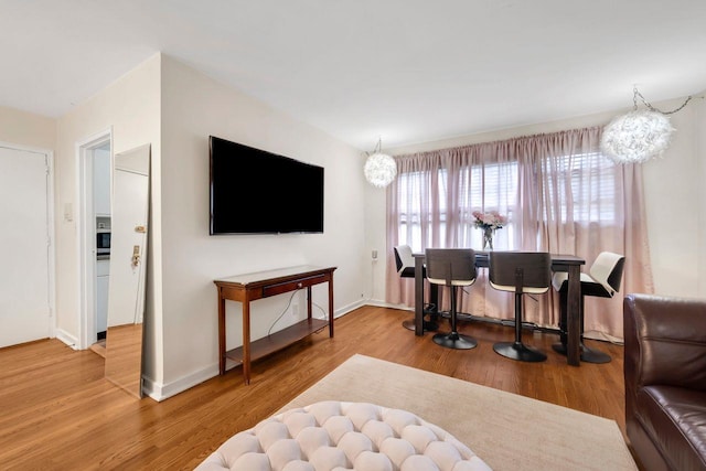 61 Columbus Ave Unit 1B, West Harrison, NY 10604 - living room with wood finished floors and baseboards