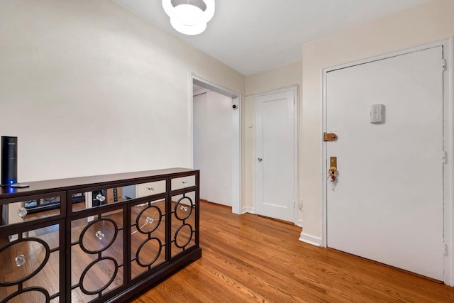 61 Columbus Ave Unit 1B, West Harrison, NY 10604 - hall featuring wood finished floors and baseboards