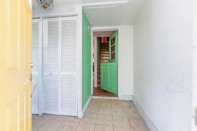 872-874 Rte 212, Saugerties, NY 12477 - hall with light tile patterned floors, attic access, and baseboards