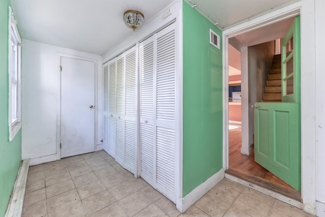 872-874 Rte 212, Saugerties, NY 12477 - corridor with light tile patterned floors and stairs