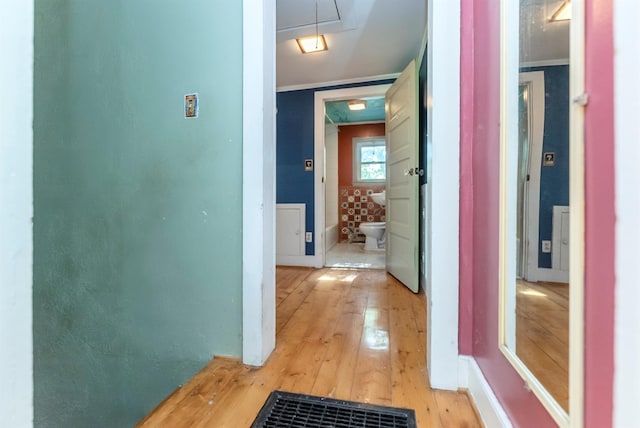872-874 Rte 212, Saugerties, NY 12477 - hallway with attic access, light wood-style floors, and crown molding