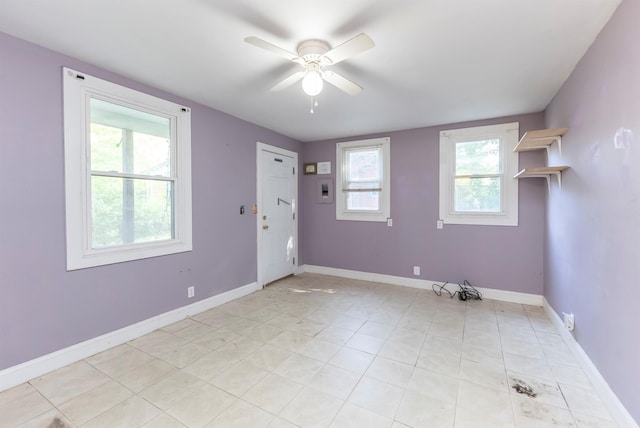 872-874 Rte 212, Saugerties, NY 12477 - empty room featuring a ceiling fan, baseboards, and light tile patterned flooring