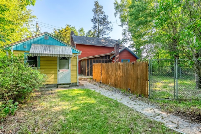 872-874 Rte 212, Saugerties, NY 12477 - view of front of home featuring a gate, an outdoor structure, and board and batten siding
