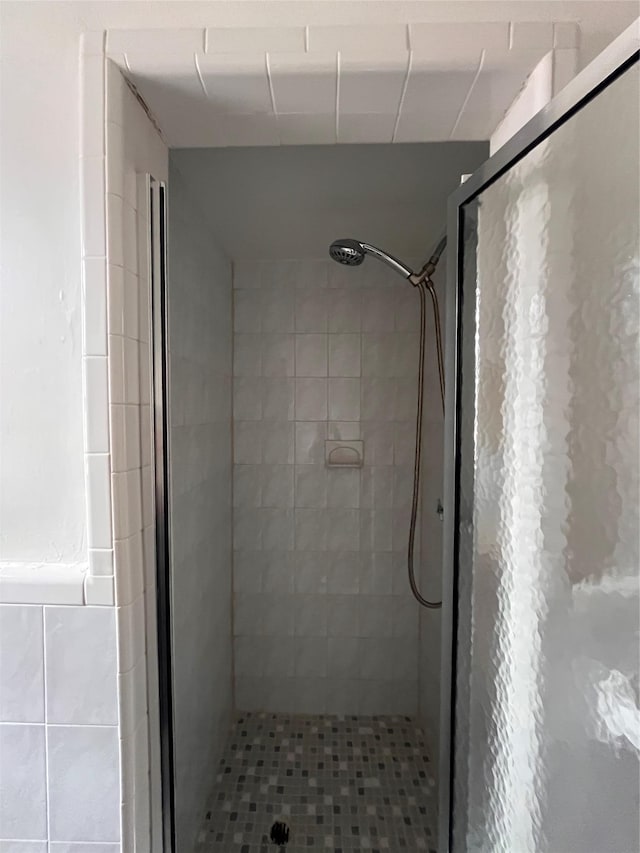 9941 64th Ave Unit F12, Rego Park, NY 11374 - full bath with a stall shower and tile patterned flooring